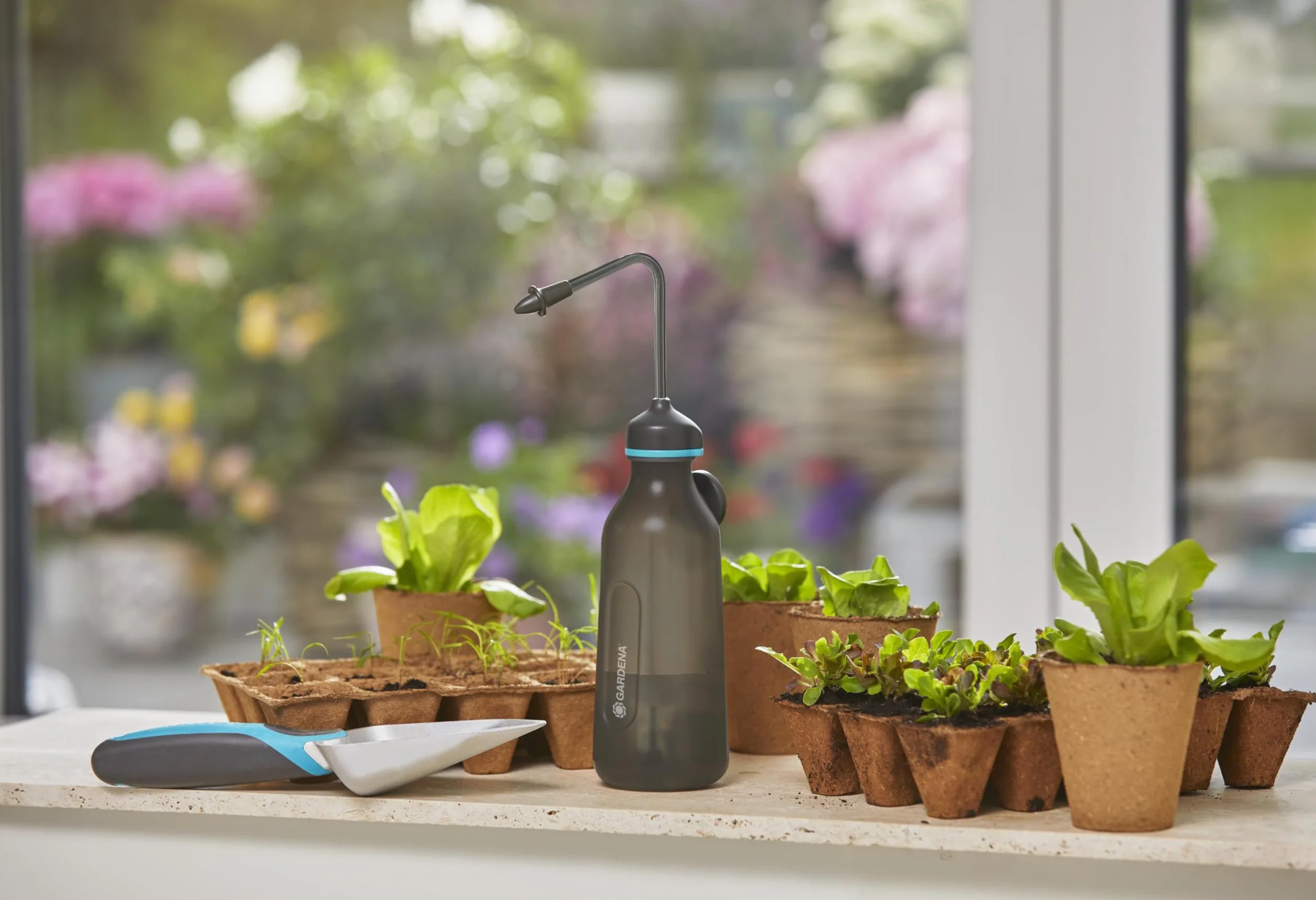 Gardena opryskiwacz miękki 0,45 l: Delikatne podlewanie sadzonek, funkcja 2 w 1 z głowicą zraszającą lub dyszą drobnostrumieniową, pojemność 450 ml (11102-20)