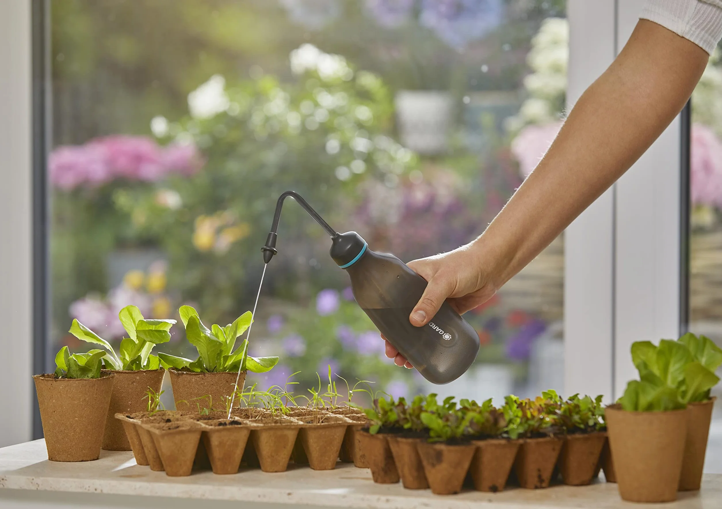 Gardena opryskiwacz miękki 0,45 l: Delikatne podlewanie sadzonek, funkcja 2 w 1 z głowicą zraszającą lub dyszą drobnostrumieniową, pojemność 450 ml (11102-20)