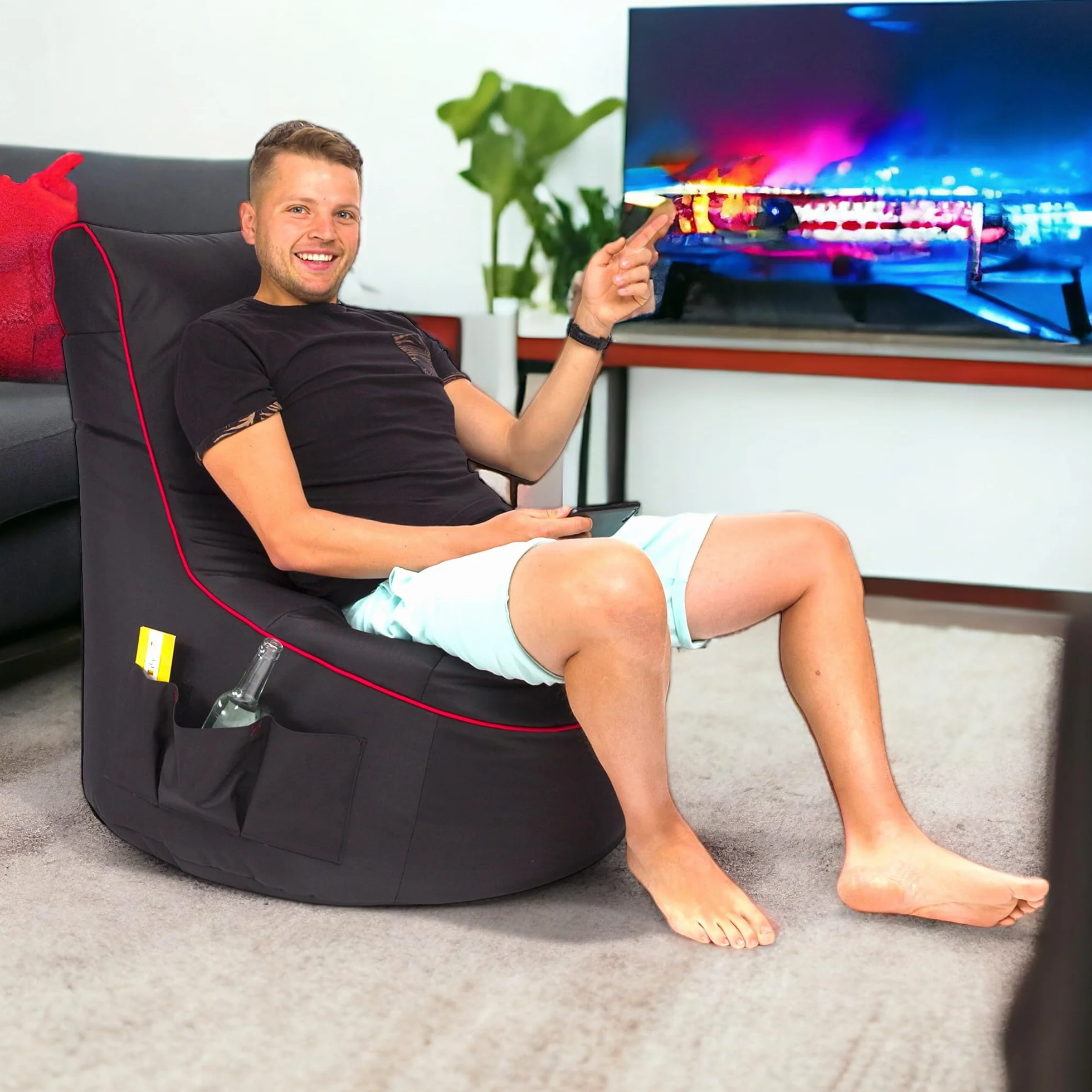 Ecopuf - Pufa Fotel Pablo - Beanbag z kieszeniami do przechowywania i uchwytem na słuchawki - Stylowa Poduszka - Worek do gier - 77x84cm, Czarno-czerwone paski